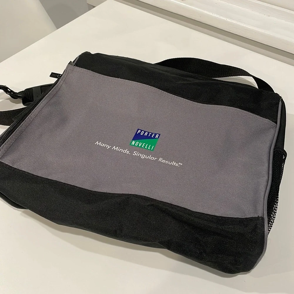 Black and grey canvas messenger bag. NWT